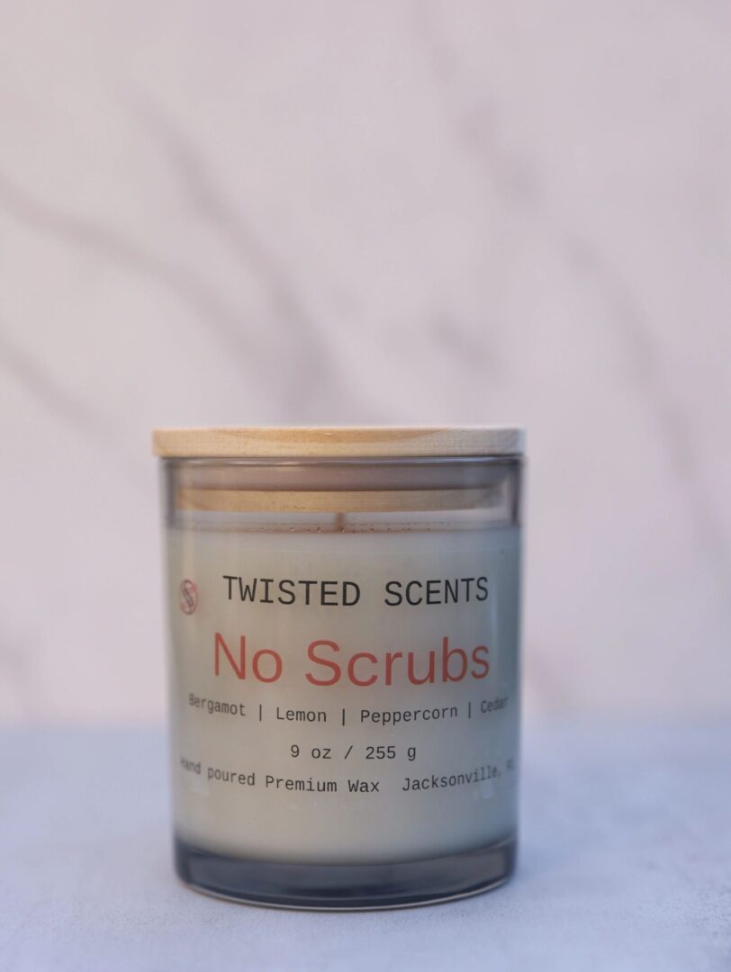 Twisted Scents candle on marble background